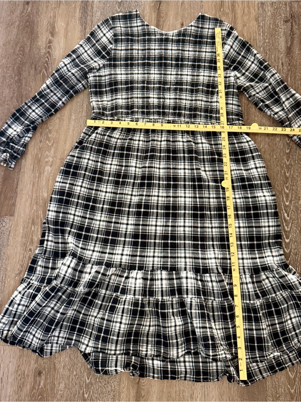 Made out of 100% recycled materials. Black/White Plaid Dress. Stretchy material